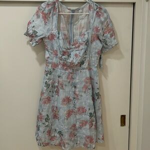 Brand new Guess dress, blue with rose print, size M.